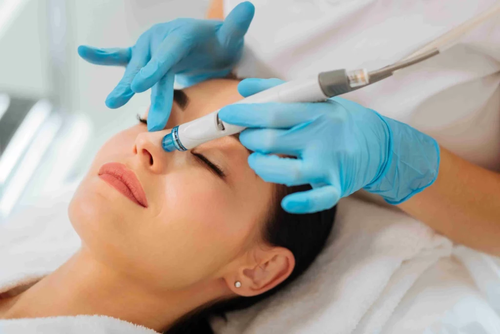 a woman getting a Hydrafacial treatment | Allure Dermatology | Edinburg, TX