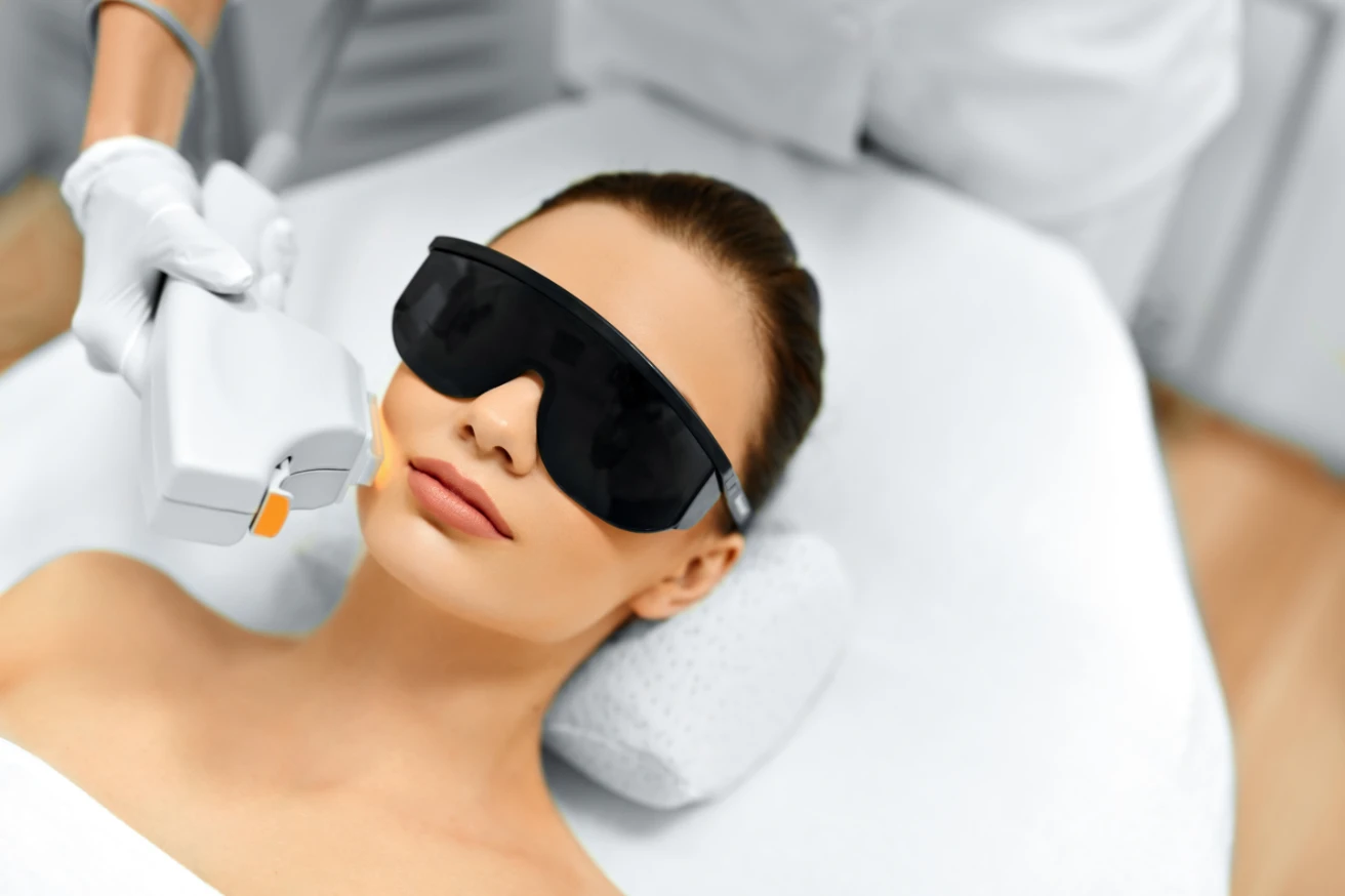 a woman getting IPL laser treatment | Allure Dermatology | Edinburg, TX