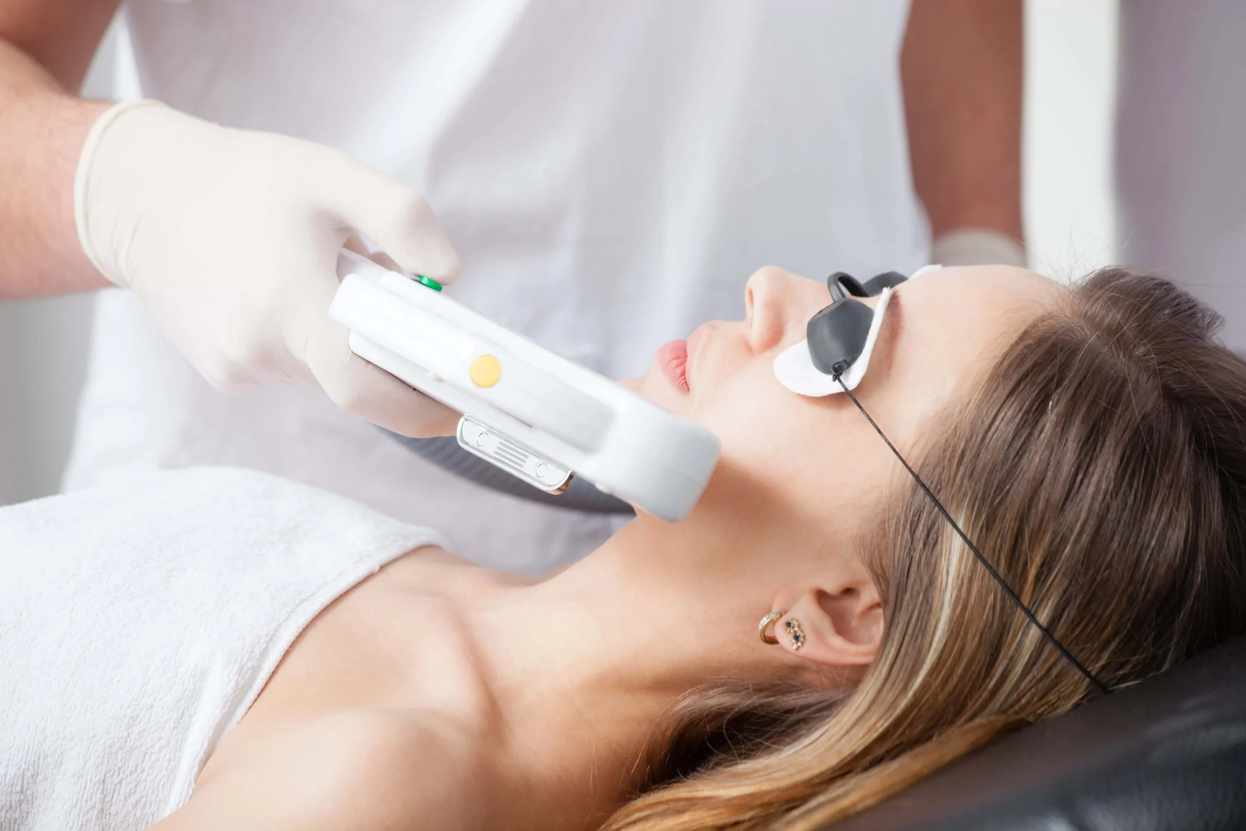 Woman getting Sciton Moxi | Allure Dermatology | Edinburg, TX